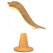 Wooden bird-shaped lamp on a white background