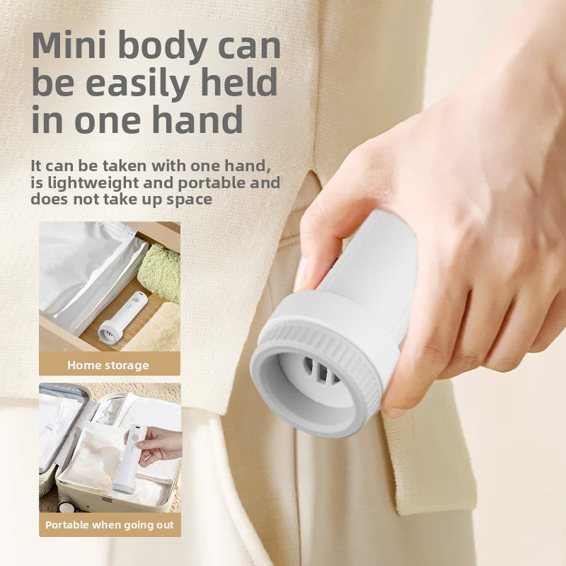 Hand holding a small gray device with text about its portability and ease of use.