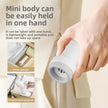 Hand holding a small gray device with text about its portability and ease of use.