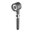 Handheld shower head with adjustable nozzles on a white background