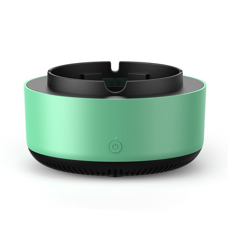 Green and black electronic device on a white background
