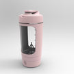 Pink portable coffee maker on a light gray background