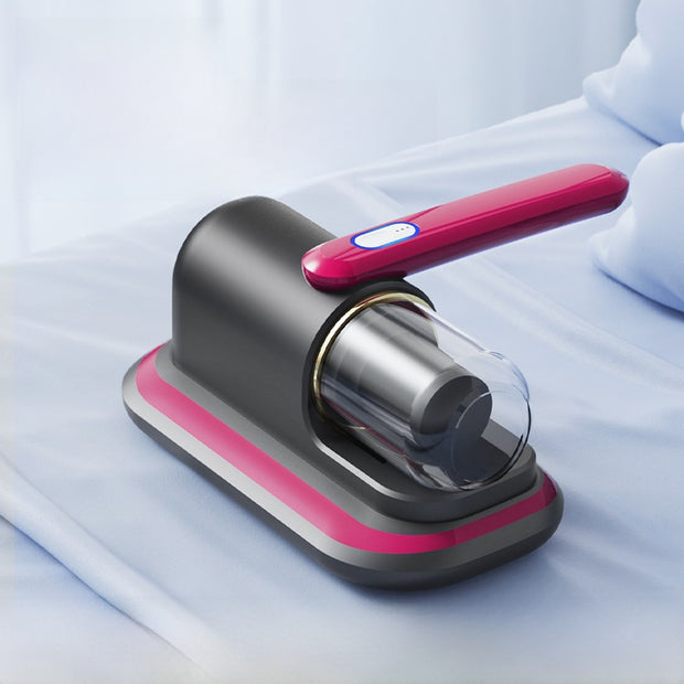 Black and pink handheld device on a light blue background