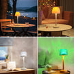 Collage of table lamps in various settings including outdoor, indoor living room, office, and bedroom.