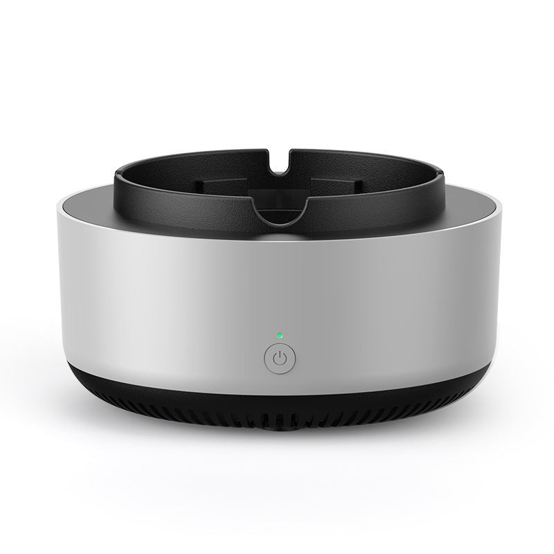 Round electronic device with black top and bottom on a white background