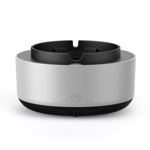 Round electronic device with black top and bottom on a white background
