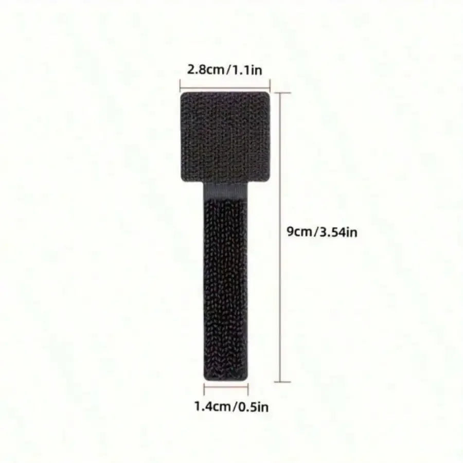 Black foam brush with measurements on a white background