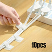 Hand using a white plastic tool on a wooden surface with '10pcs' text.