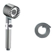 Handheld shower head with flexible hose on a white background