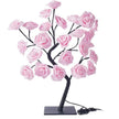 Decorative lamp with pink roses on a white background