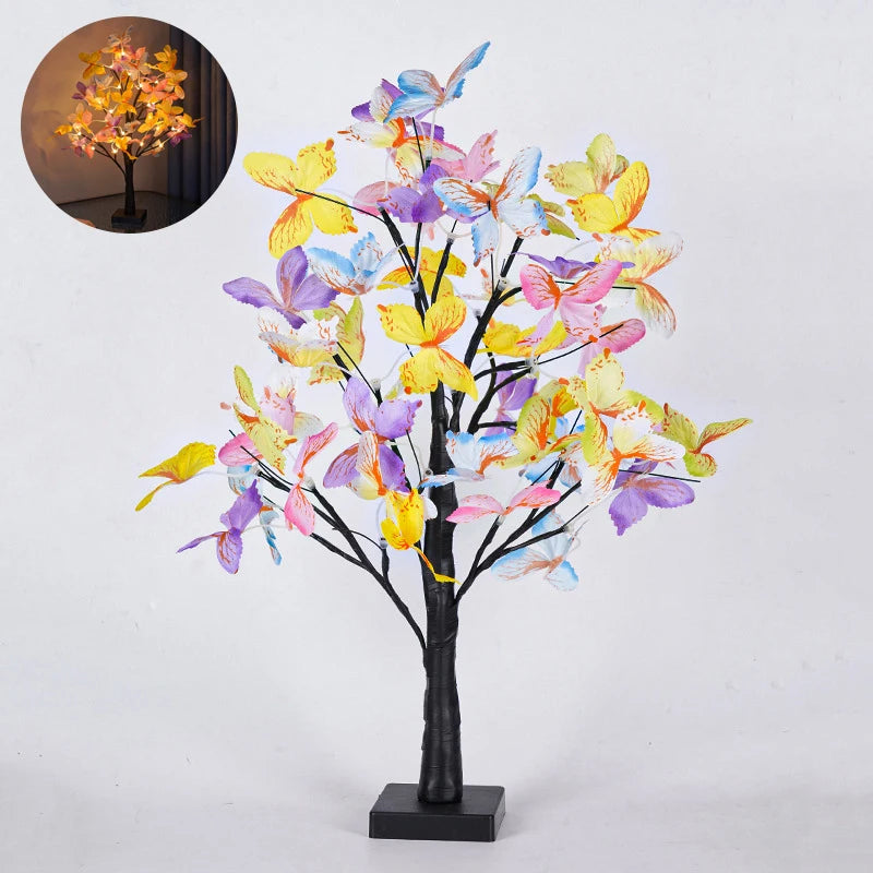 Decorative tree with colorful butterfly-shaped lights on a white background