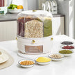 Kitchen scene with a food storage container and various bowls of grains on a counter.