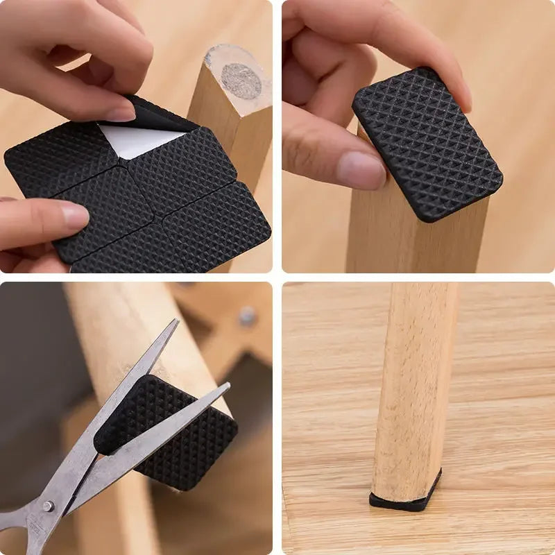 Black textured square being used as a furniture leg stopper on a wooden surface.