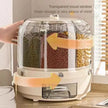 Transparent grain storage container with visible grains inside, on a kitchen counter.