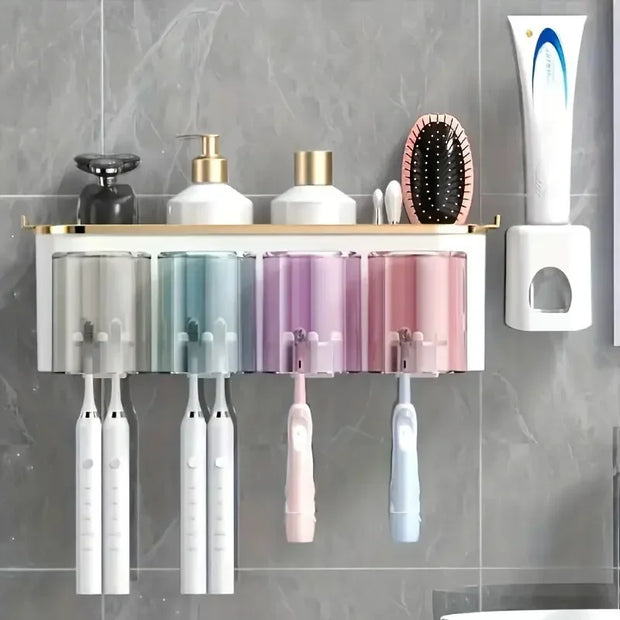 Bathroom shelf with toothbrush holders and colorful electric toothbrushes on a gray tiled wall.