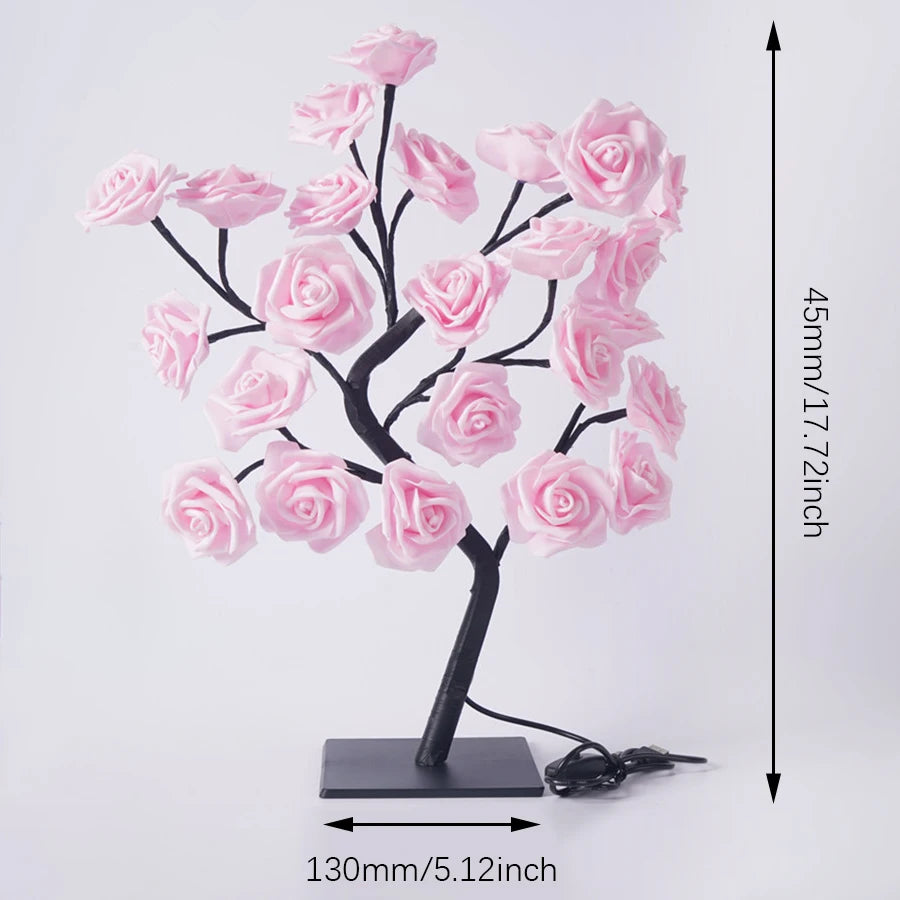 Decorative lamp with pink floral branches on a white background