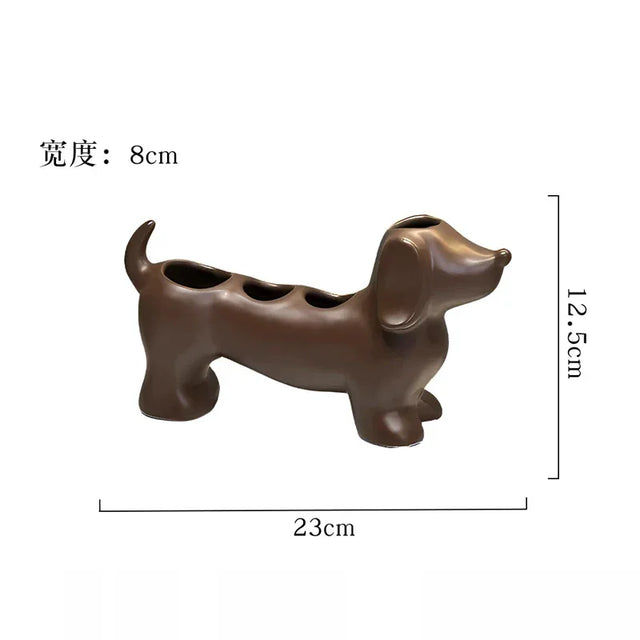 Dog-shaped ceramic planter with dimensions on a white background