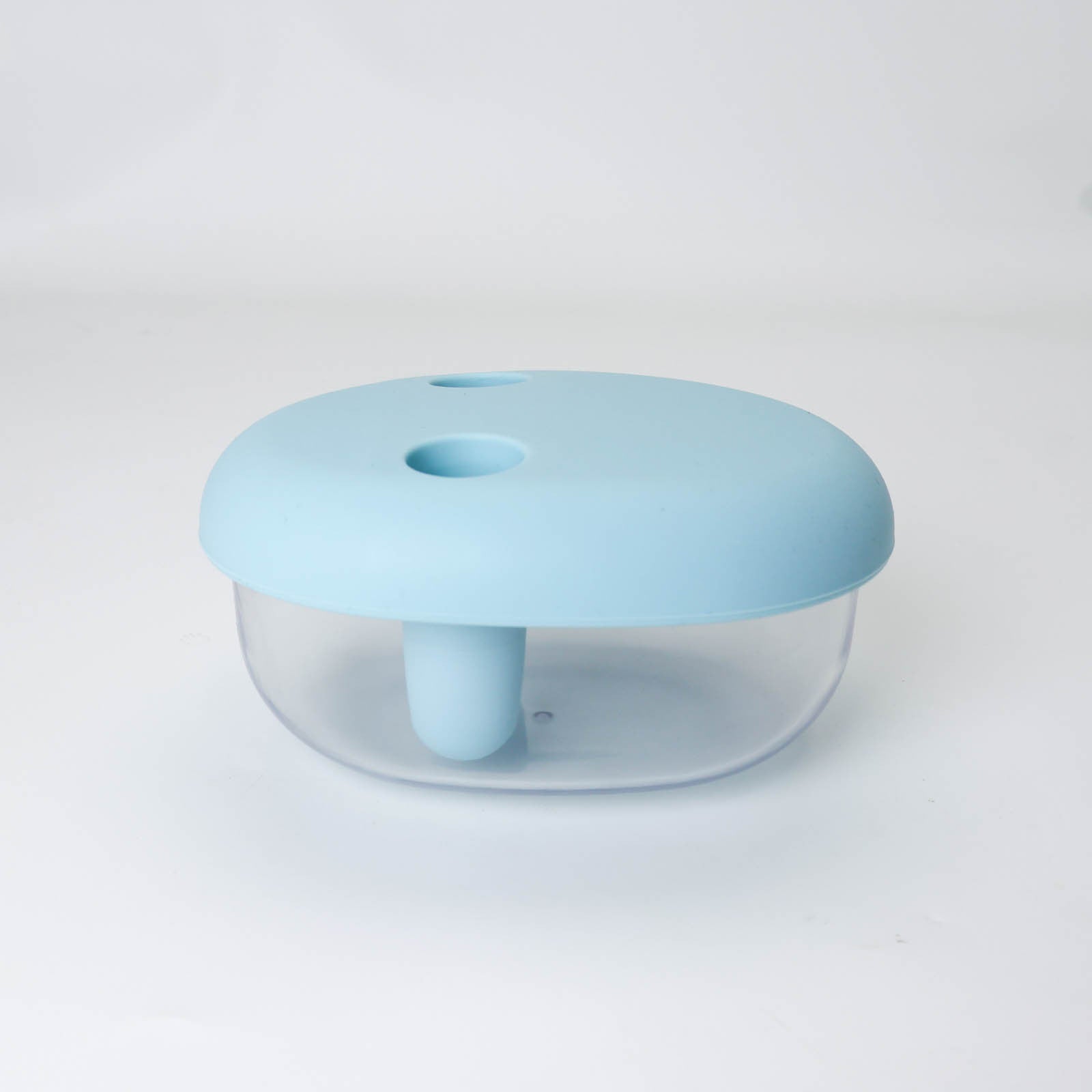Clear container with a light blue lid on a white background