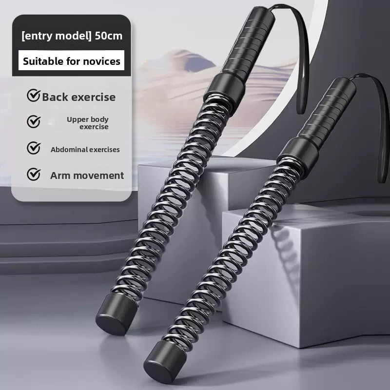 Pair of black exercise sticks with spring mechanism on a gray background