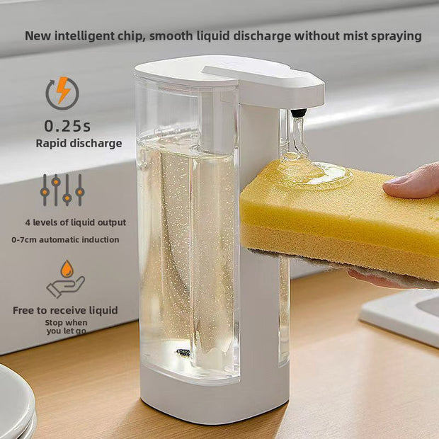 Automatic liquid soap dispenser with sponge holder on a wooden surface