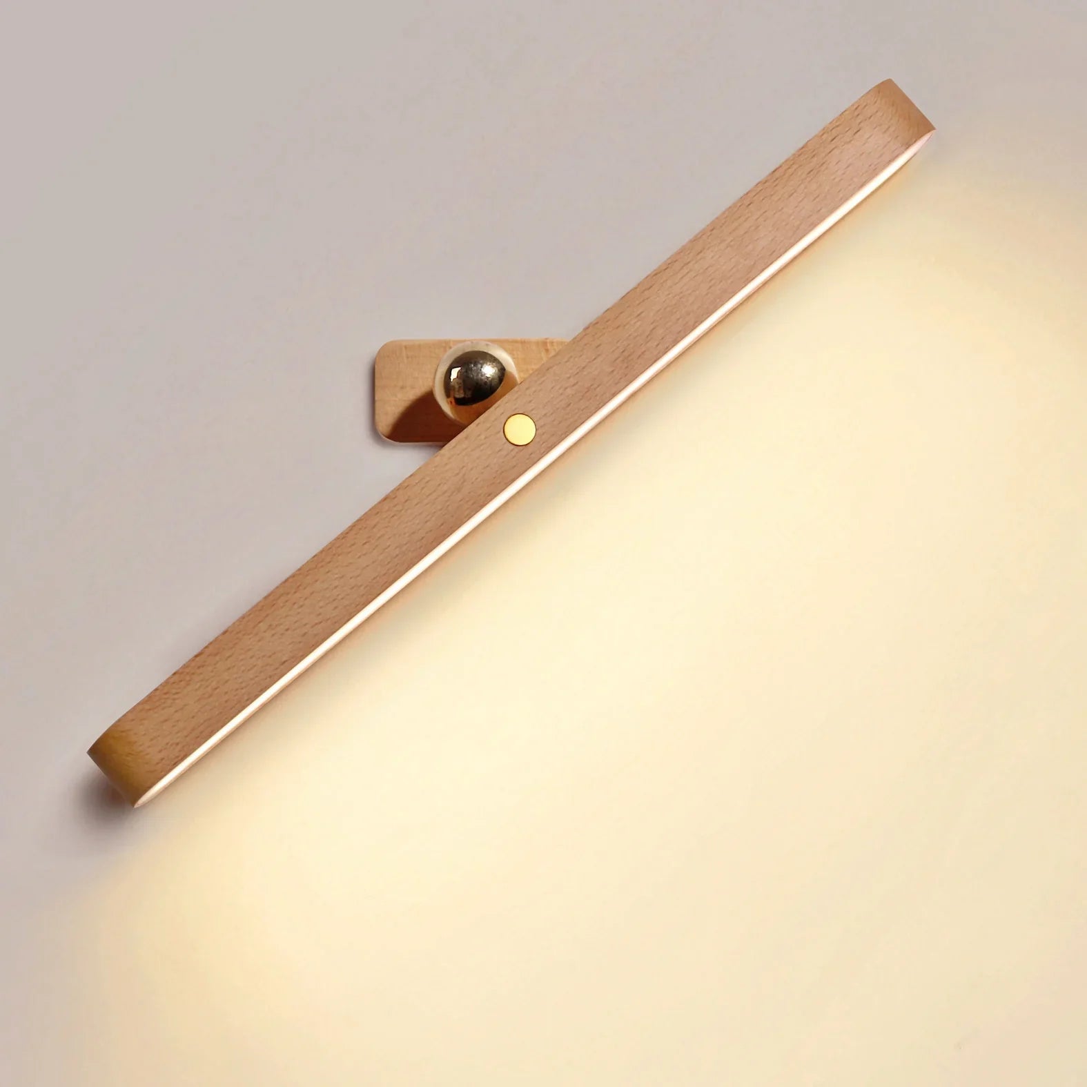 Wooden wall lamp with warm light on a neutral background