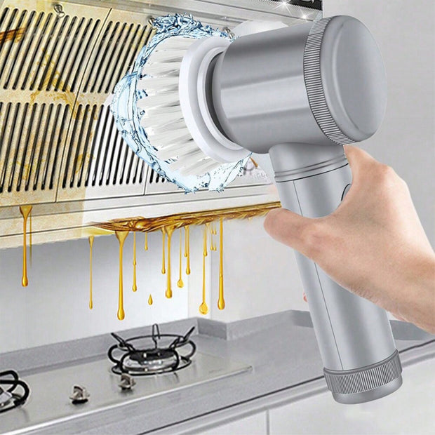 Handheld showerhead being used to clean a kitchen exhaust hood.