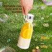 Portable cup with lemon slice held by a hand on grass with bubbles, text about capacity and weight.